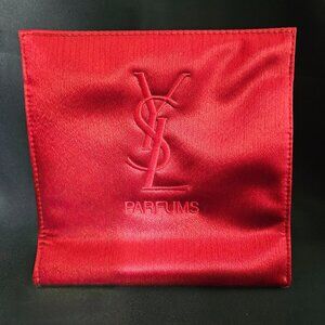 Yves Saint Laurent Beauty red satin cosmetic bag